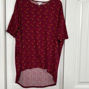 Lularoe shirt size M. Red with flowers. New no tag. Polyester and spandex.